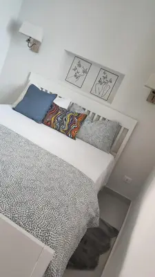 Letto o letti in una camera di Appartamento Bella Vista
