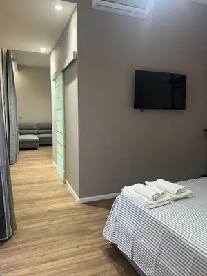 Letto o letti in una camera di Celeste Home Center
