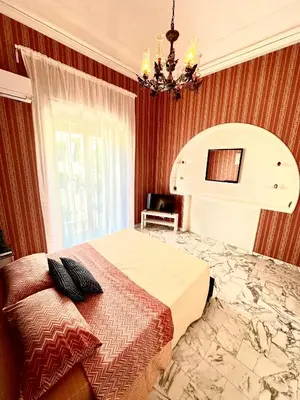 Letto o letti in una camera di L'angelo di casa mia