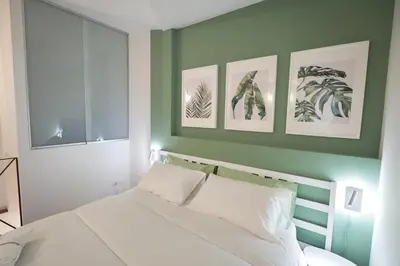 Letto o letti in una camera di Via Cagliari Home