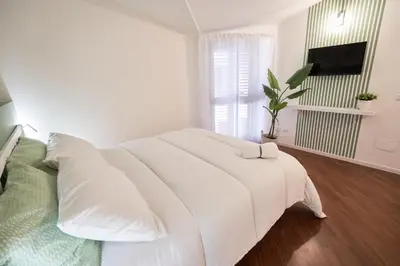 Letto o letti in una camera di Via Cagliari Home