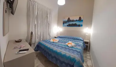 Letto o letti in una camera di Debora Holiday House