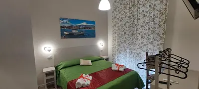 Letto o letti in una camera di Debora Holiday House
