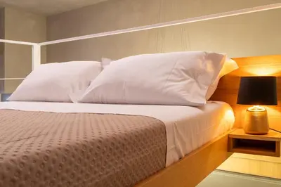 Letto o letti in una camera di Luxury urban craft