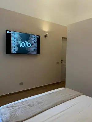 Letto o letti in una camera di Domus Catania Centro