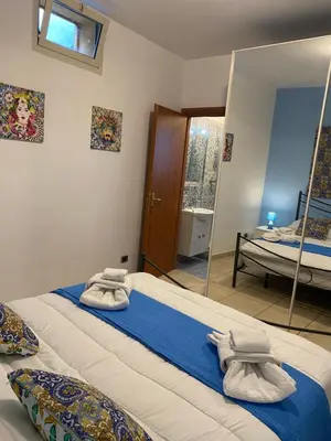 Letto o letti in una camera di Vacanza a Catania House
