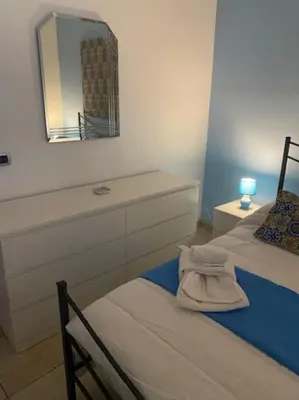 Letto o letti in una camera di Vacanza a Catania House