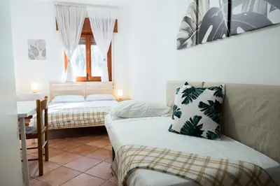 Letto o letti in una camera di I Marchesi dell'Etna