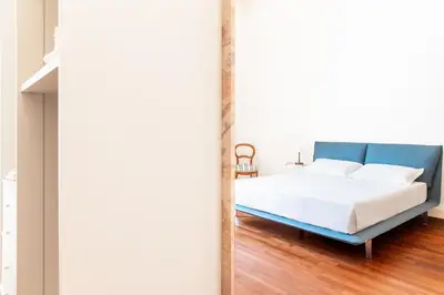 Letto o letti in una camera di Palazzo Marinella Sicilian Luxury Stay