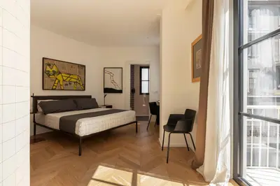 Letto o letti in una camera di Fra le righe - arte , design e interni siciliani
