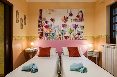 Letto o letti in una camera di Villa Rubino