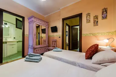 Letto o letti in una camera di Villa Rubino