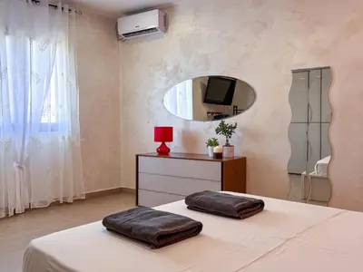 Letto o letti in una camera di Kira House