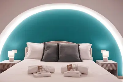 Letto o letti in una camera di R-HOME Crispi