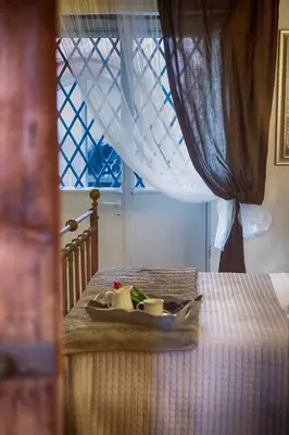 Letto o letti in una camera di Etna Dependance