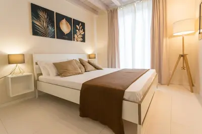 Letto o letti in una camera di Stesicoro Exclusive House