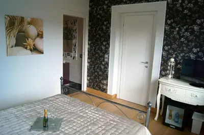 Letto o letti in una camera di Baia Di Ognina