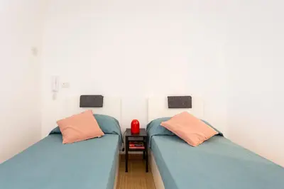 Letto o letti in una camera di Charm and style in city centre Catania