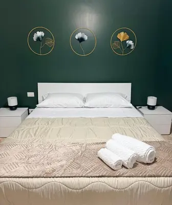 Letto o letti in una camera di Etna Breeze Apartment