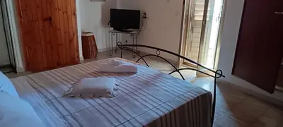 Letto o letti in una camera di Casa Matì