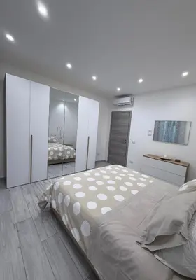 Letto o letti in una camera di AlbaHouse
