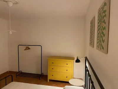 Letto o letti in una camera di Cortile Benedettini