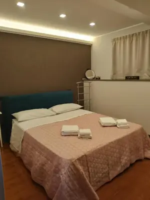 Letto o letti in una camera di Al Cortile