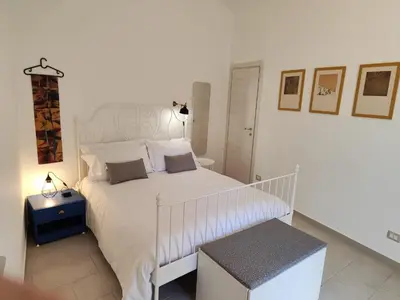 Letto o letti in una camera di Vico Si cu ro