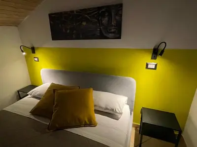 Letto o letti in una camera di casa catania termini home 5
