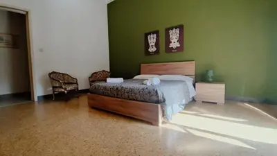 Letto o letti in una camera di Dimora Eliodoro
