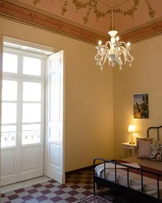 Letto o letti in una camera di Palazzo Fiammingo Rooms