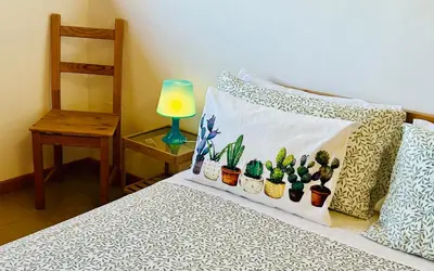 Letto o letti in una camera di Villa Carolea