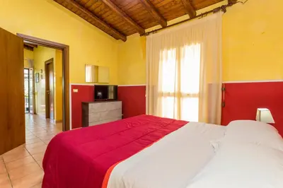 Letto o letti in una camera di Casa Vacanze vicino Etna - Natura dell'Etna