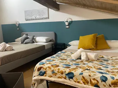 Letto o letti in una camera di casa catania termini home 4
