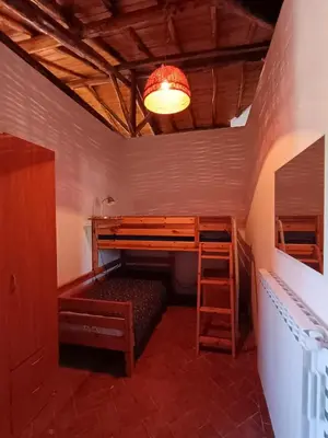 Letto o letti in una camera di Etna Antico palmento