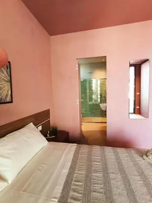 Letto o letti in una camera di Torre G Luxury Apartment