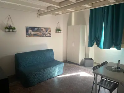 Area soggiorno di casa catania termini home 3