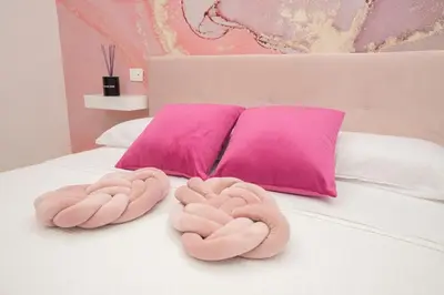 Letto o letti in una camera di 4 Rooms Rosario