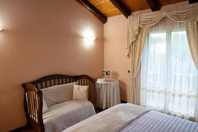 Letto o letti in una camera di Villa Clara Nicolosi