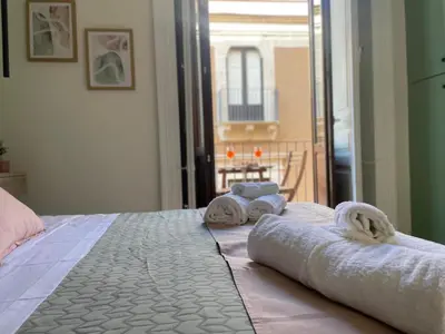 Letto o letti in una camera di Maison Etnea