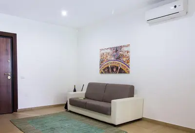 Area soggiorno di Residence Rapisardi by RECEPTIO