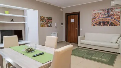 Area soggiorno di Residence Rapisardi by RECEPTIO