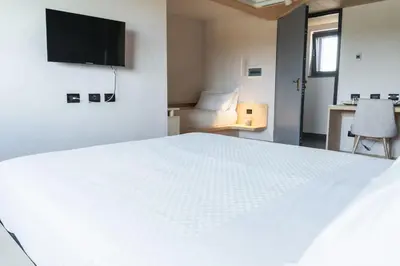 Letto o letti in una camera di Bahal dell'Etna Agri-Resort