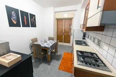 Cucina o angolo cottura di Appartamento Etna & Catania intimo comodo max 4 persone