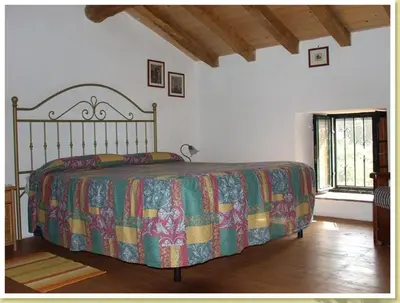 Letto o letti in una camera di Codavolpe giardino di tea