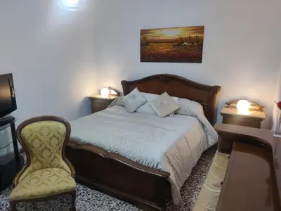 Letto o letti in una camera di Annamaria Apartment AMA