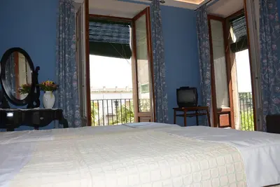 Letto o letti in una camera di B&B Villa Maria