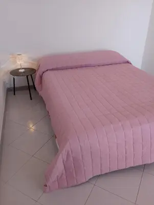 Letto o letti in una camera di MareBlu