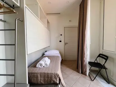 Letto o letti in una camera di B&B Don Diego Pedara