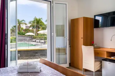 Letto o letti in una camera di Villa Antonio